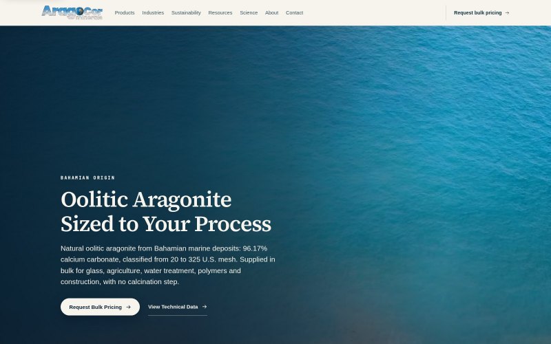 AragoCor Minerals homepage: oolitic aragonite sized to your process, over Bahamian ocean photography